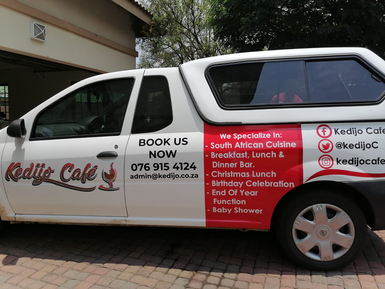 Full vehicle branding on a café delivery bakkie