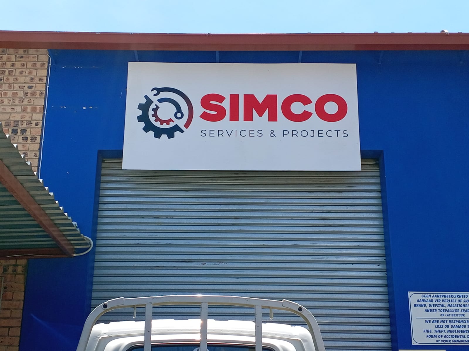 Shopfront sign for SIMCO Services and Projects